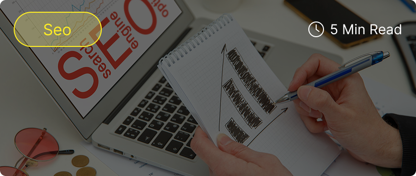 SEO concept with notes and laptop